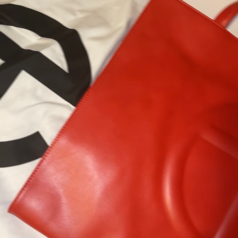 Red large leather bag